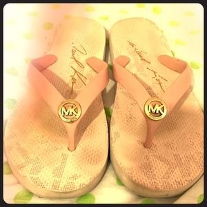 Michael Kors flip flops.